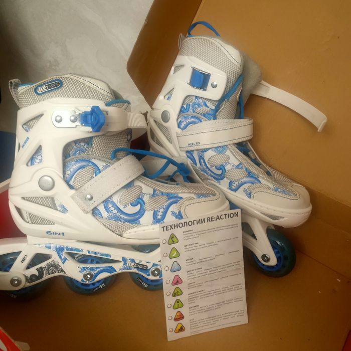 Роликовые коньки