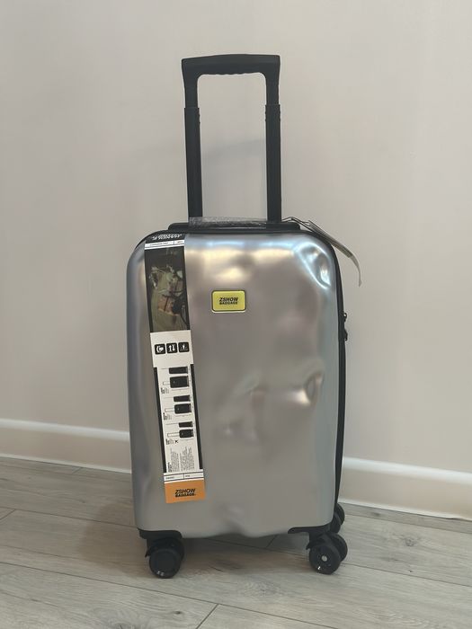 Пластиковые, гелевые, тканевые чемоданы