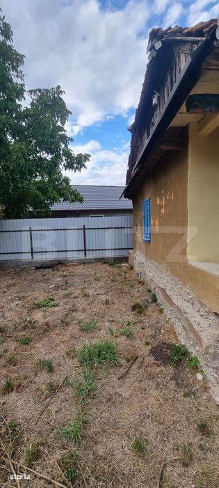 Casa cu doua corpuri