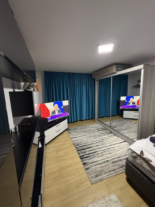 ⸻  Mobilă living modernă – design elegant și spațioasă