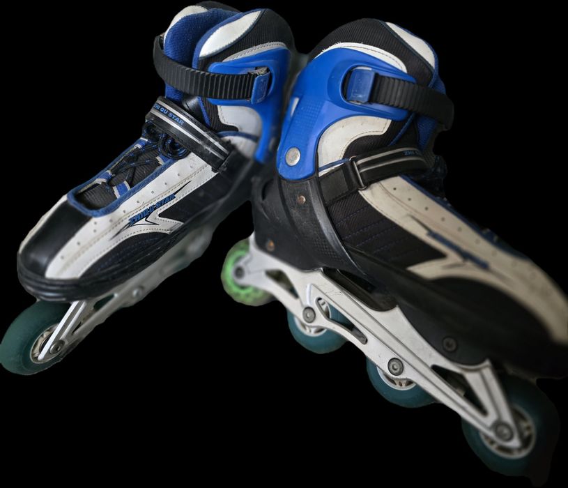 Роликовые коньки