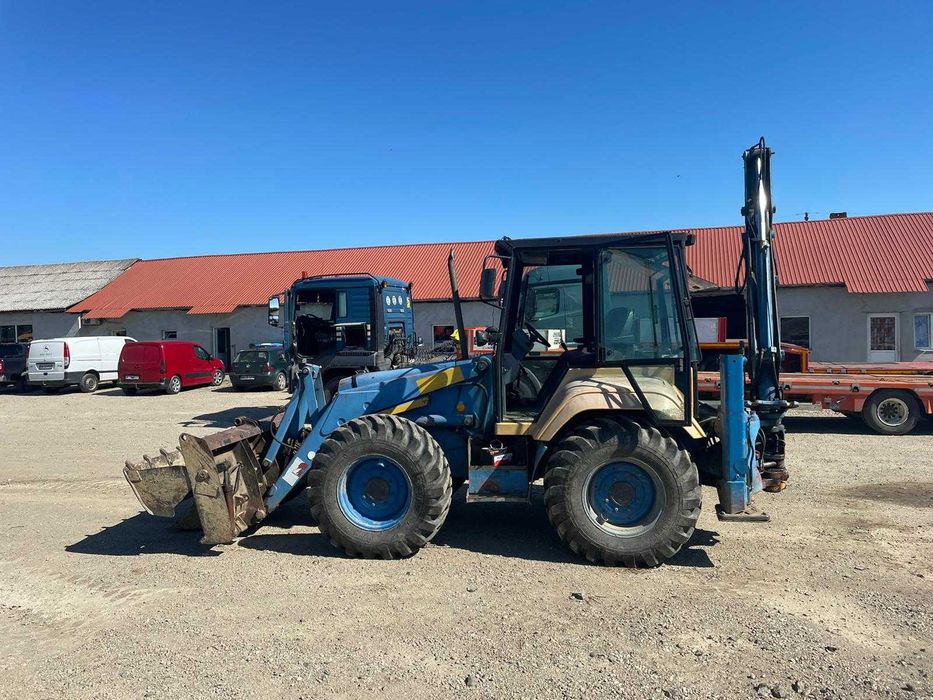Dezmembrez buldoexcavator FERMEC 965- piese de schimb Fermec
