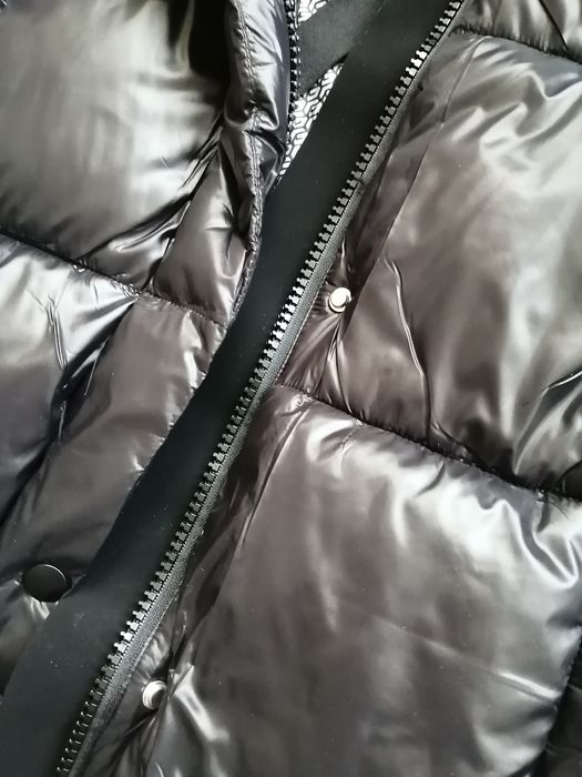 Продам новый пуховик ( Kimex)