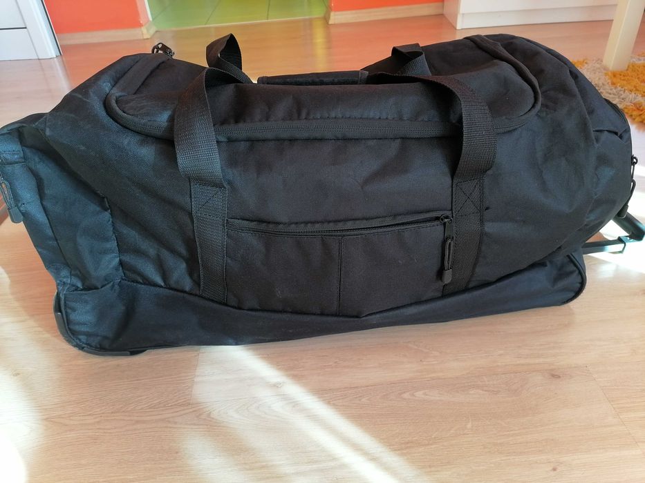 Пътна чанта с колела и дръжка