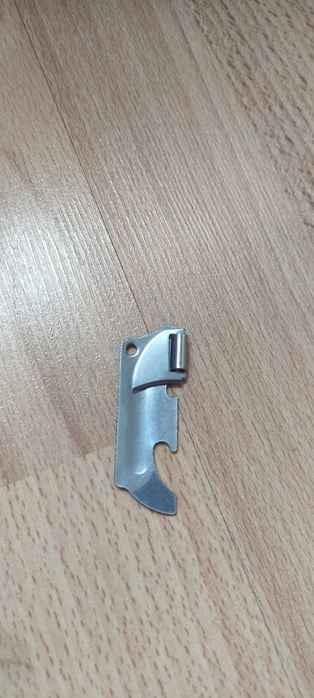 Открывалка консервы и бутылок.