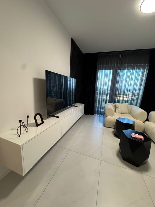 Chirie apartament 2 camere + living, cu parcare, in bloc nou nufarul