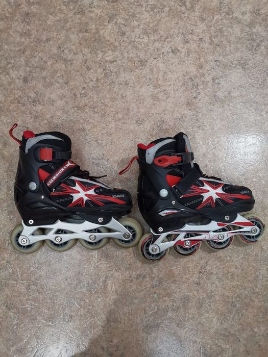 Роликовые коньки