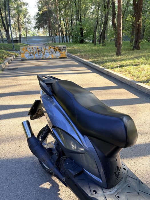 Скутер Racer stells
