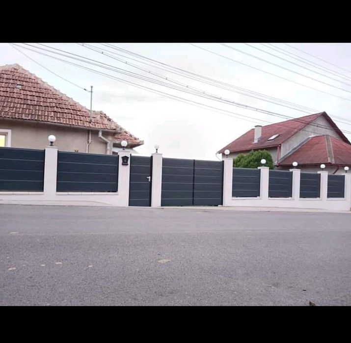 Usa Garaj "paznic mut de fier și șina, usa-si face treaba-n tihnă"