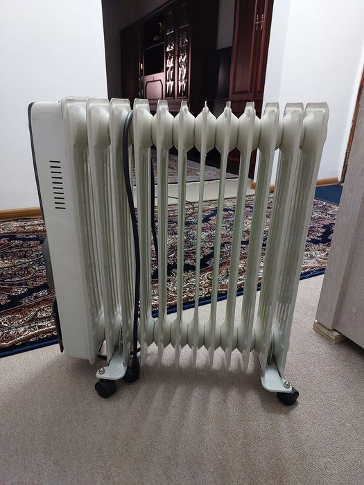 Масляный обогреватель DeLongni