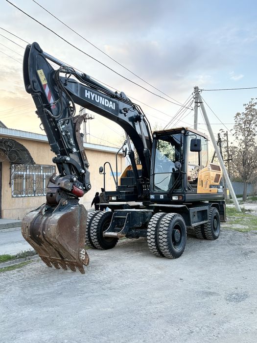 Услуга экскаватора погрузчика