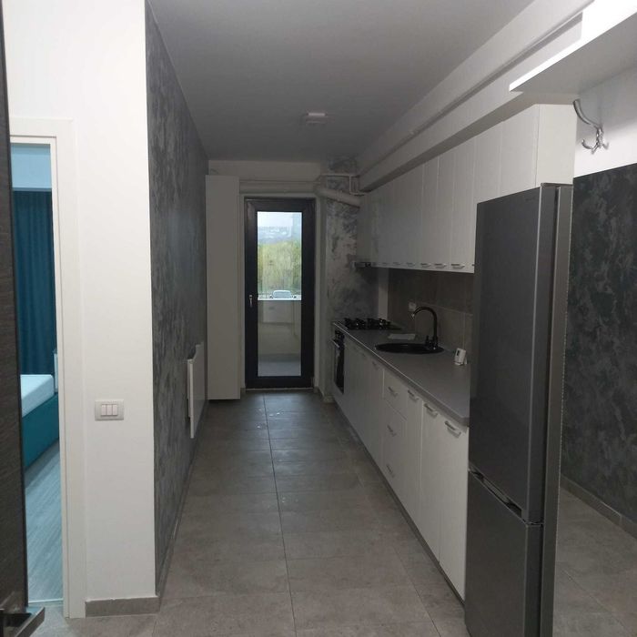 Închiriez garsoniera confort 1, 47 metri pătrați și loc de parcare