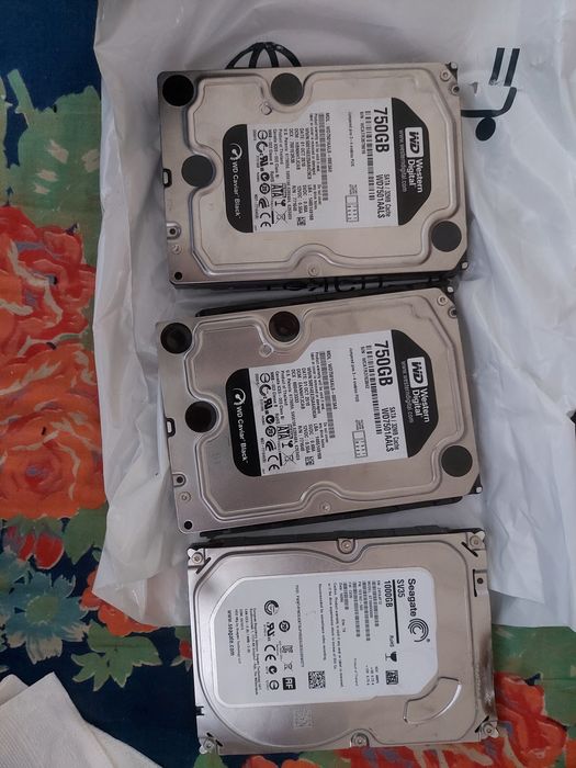 Жесткий диск HDD 1TB Seagate SV35 ва 750GB WD Black (3.5)