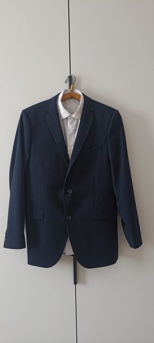 Продам костюм с брюками и рубашкой