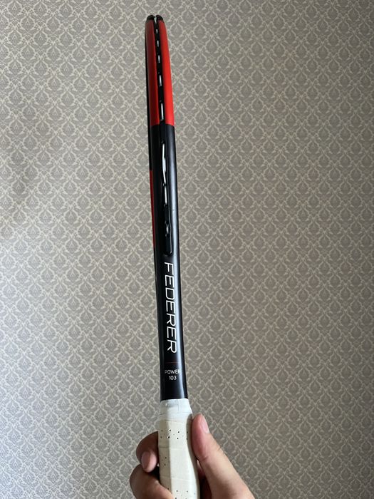 Теннисная ракетка