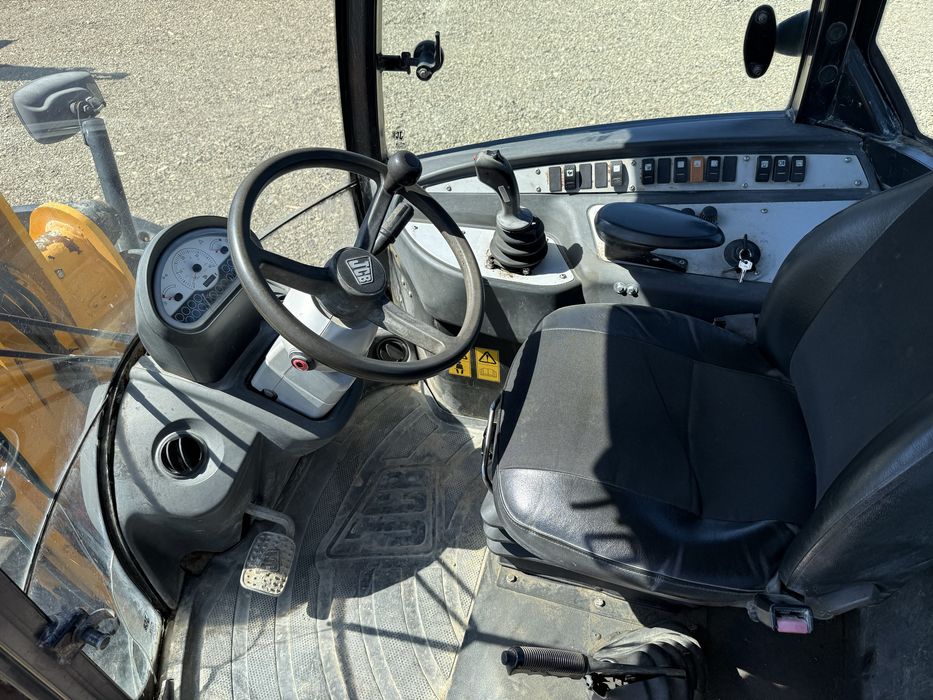Jcb 409 vola incarcator frontal  furci cupa volvo