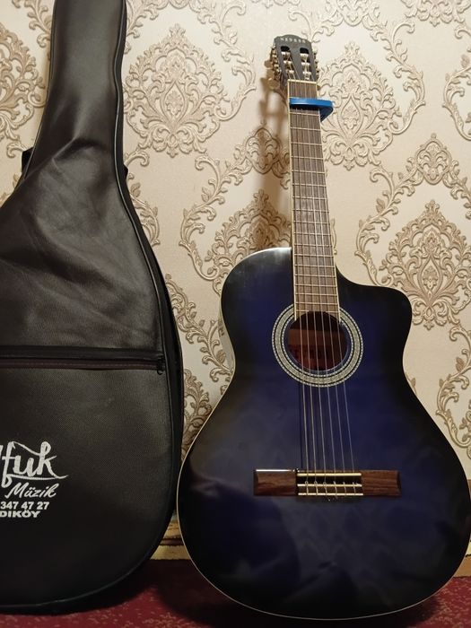 Gitara Sotiladi  holati yangi turkiyadan kelgan