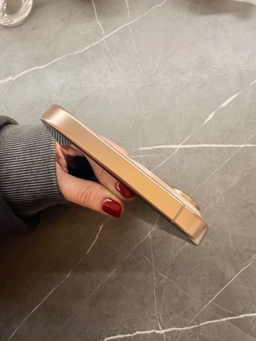 •	iPhone 16 Pro Max Desert Titanium