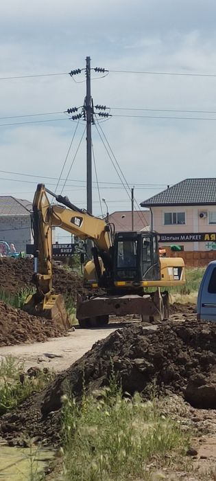 Услуга Экскаватор в Астане