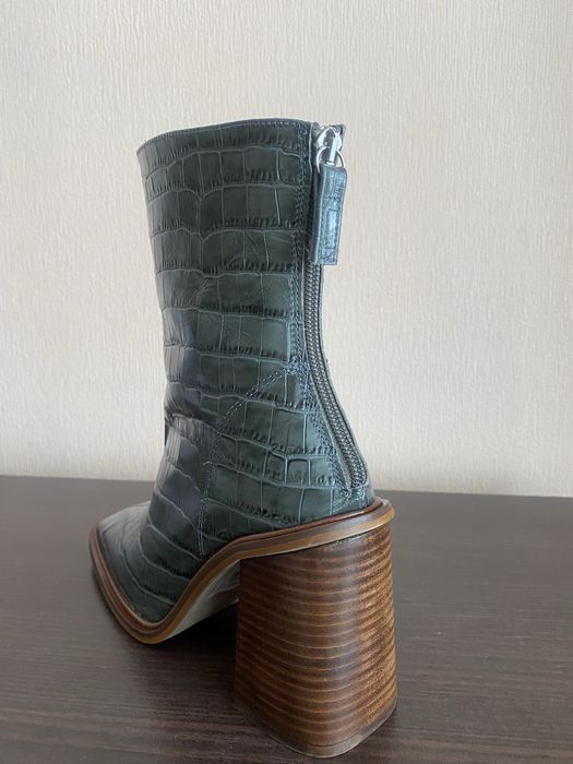 Пуховик зимний новый