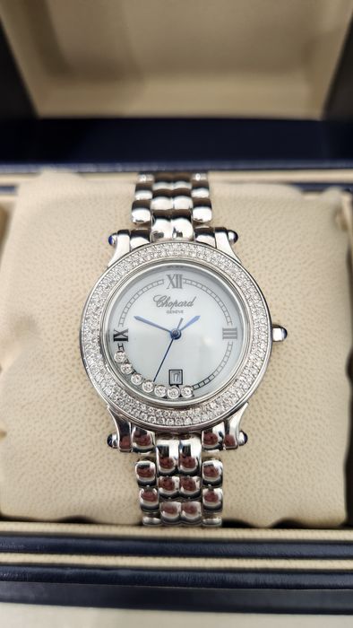 Золотые женские часы Chopard