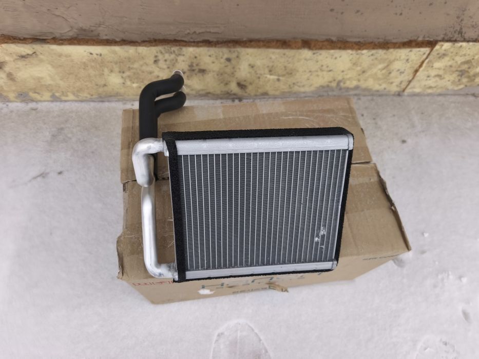 Радиатор печки теплообменник отопителя Киа Сид 97138J7000