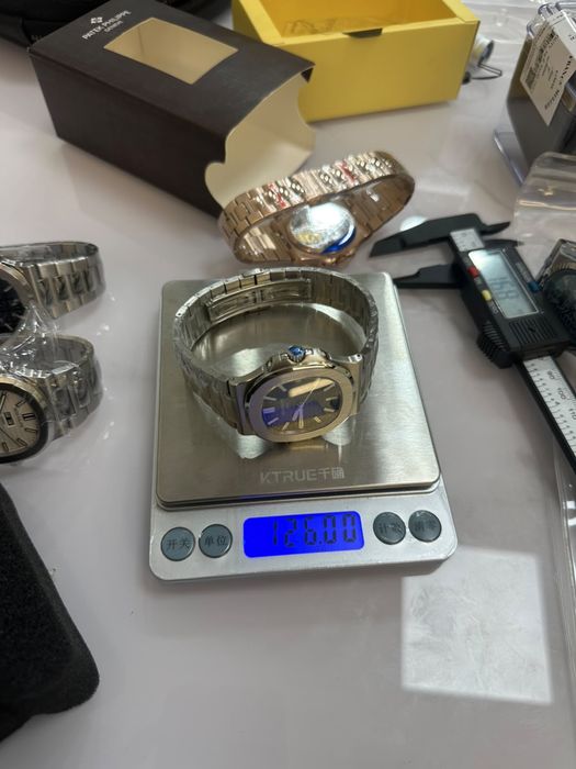Patek philippe nautilus часы