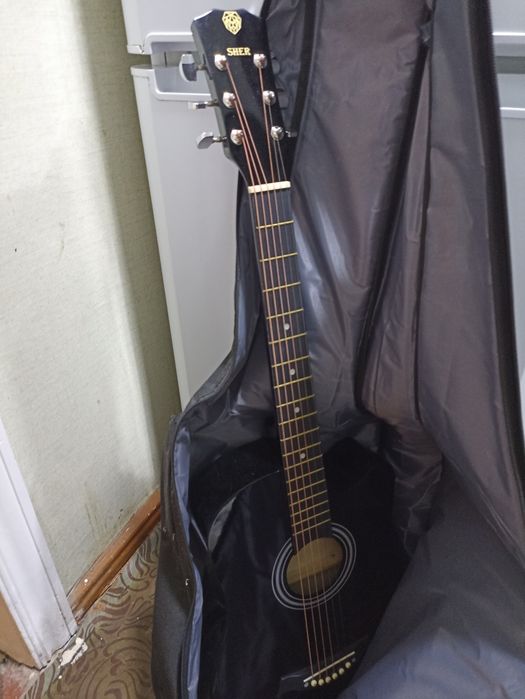 Sher gitara sotiladi