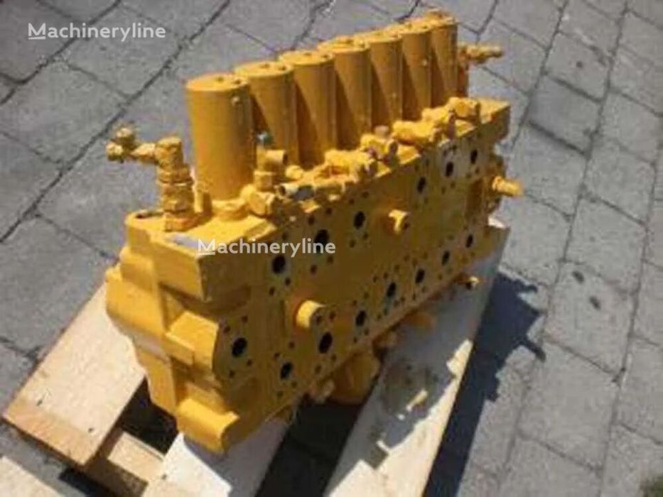 Distribuitor hidraulic pentru utilaje de construcții echipat cu