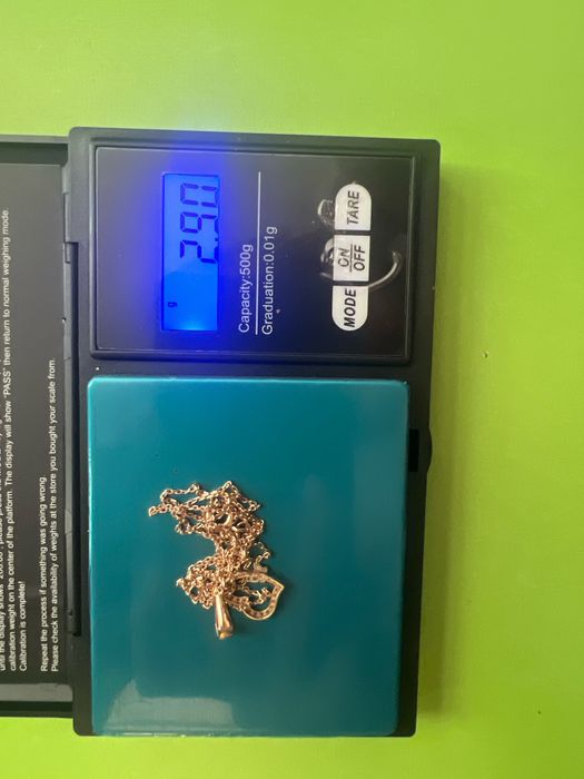 Золотая цепочка с кулоном