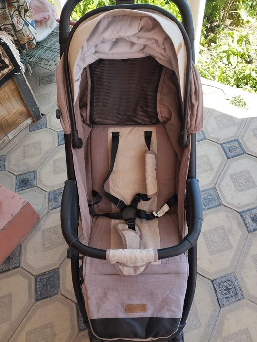 Детская коляска фирмы Teknum