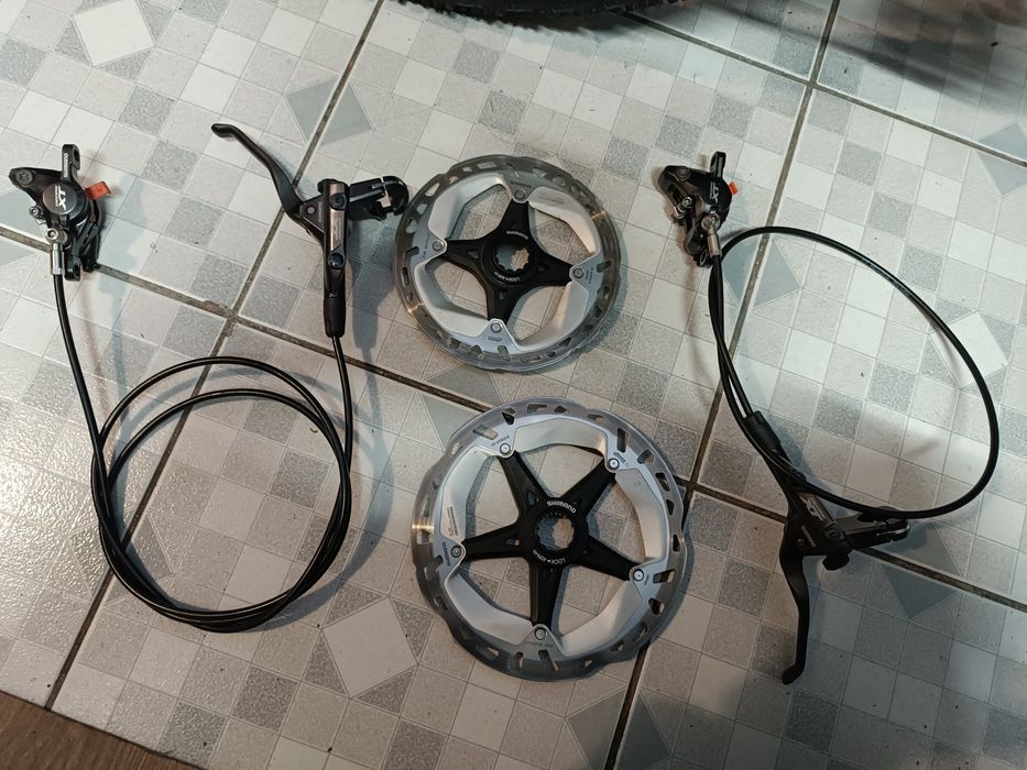 Frâne hidraulice Shimano Deore XT+discuri XT