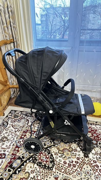 Коляска фирма ining baby