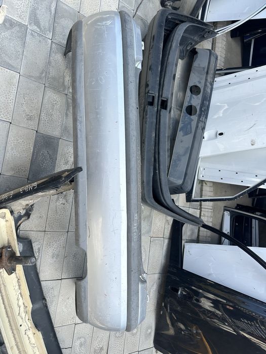 Задний бампер Мазда 626 птичка