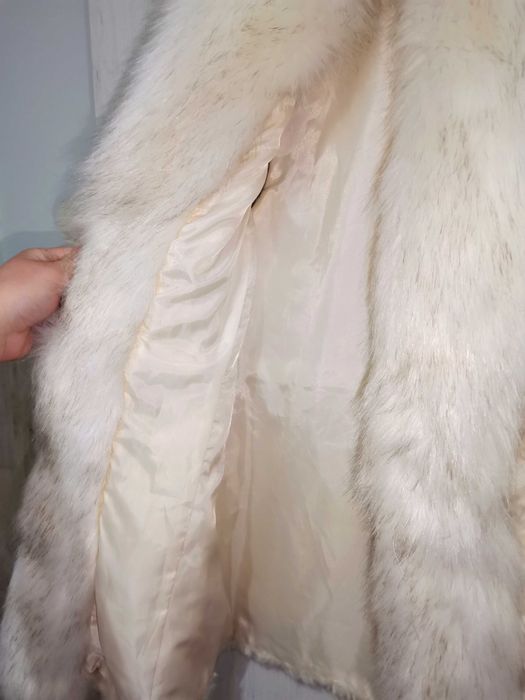 Vesta de blana, puf