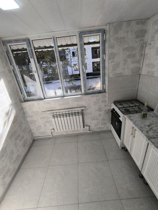 Янгиюль. Новый евро ремонт под ключ. 2 х ком. 1/2 кирпич . 58 м2. Огор