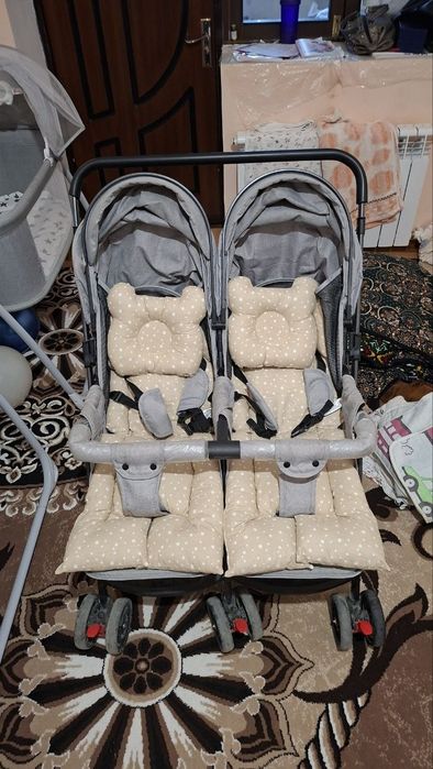 Ikkita belanchak va egizak kolyaska