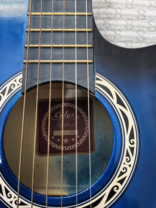 Продам детскую гитару