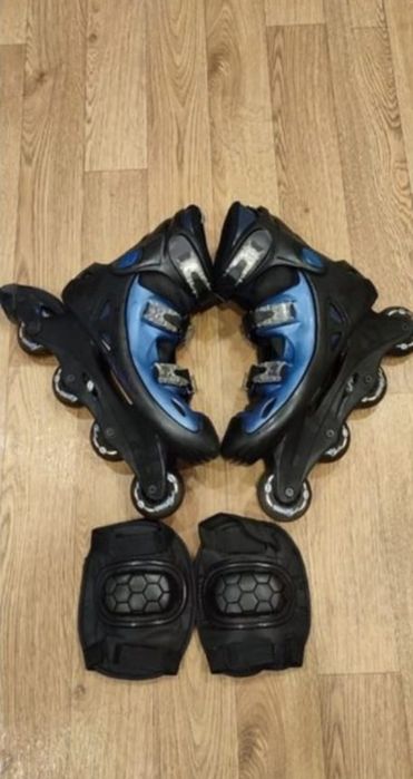 Роликовые коньки