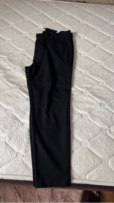 продам  черные брюки школьные