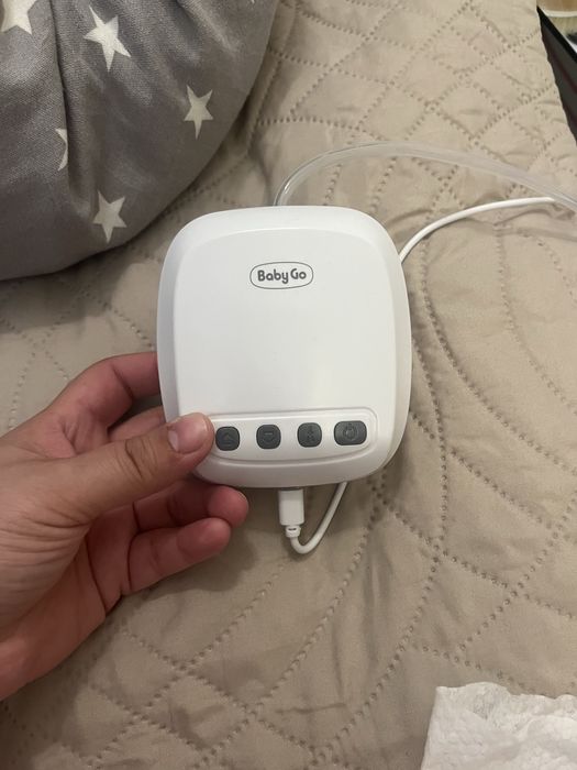 Электрический молокоотсос