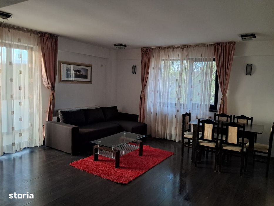 Închiriez apart cu 3 camere, cu gradina proprie și parcare subterana.