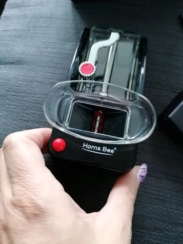 Aparat pentru înfășurat țigări.