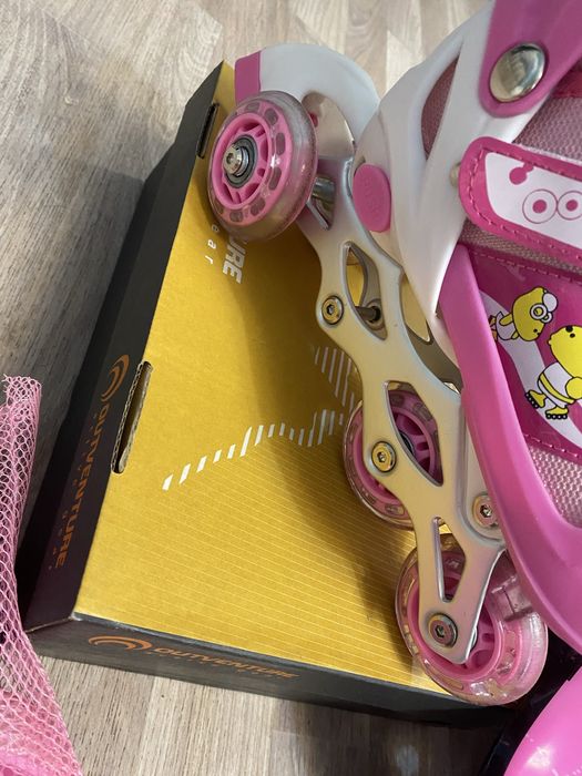 Роликовые коньки