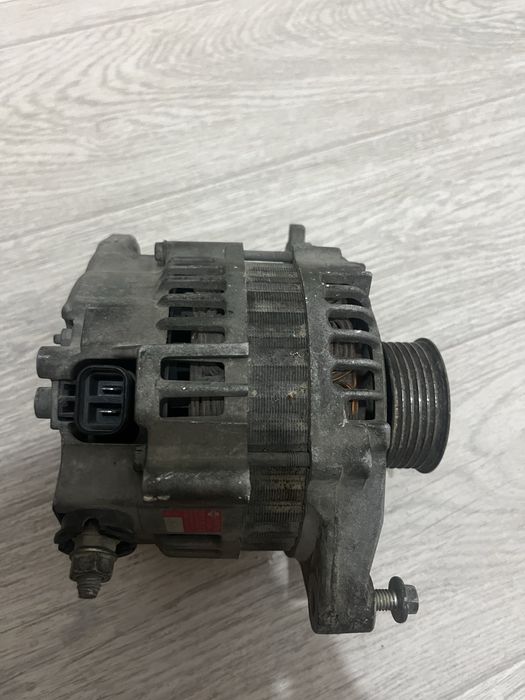 Генаратор Ниссан примера Р 12