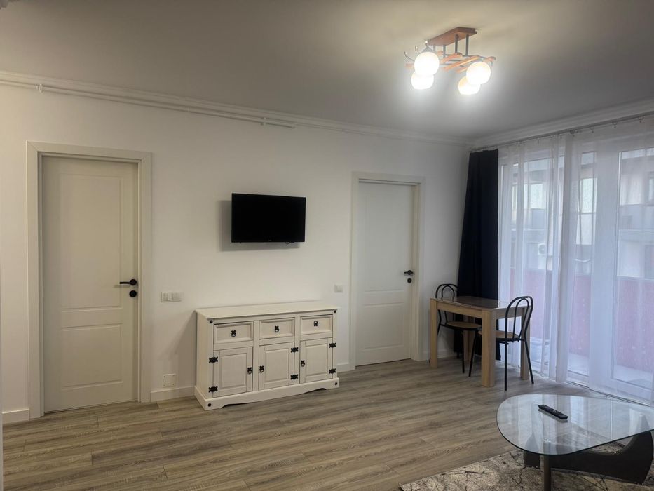 Apartament de închiriat în bloc nou cu garaj subteran direct e la prop
