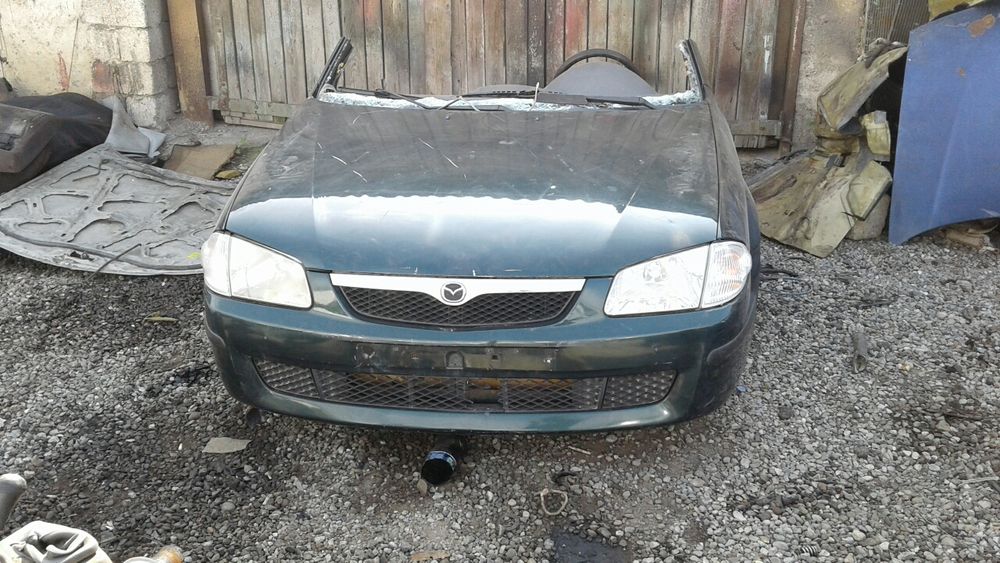 Запчасти Mazda 323