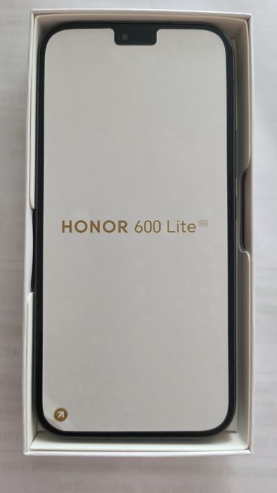 Honor 600 lite.Чисто Нов с две години гаранция от Технополис