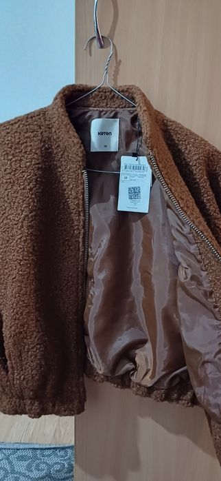 Продам куртку теплую