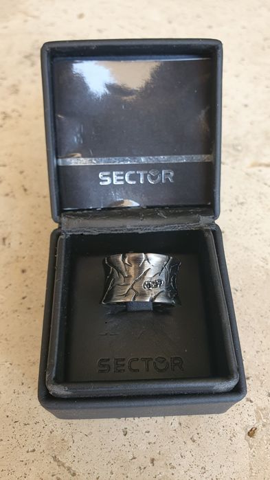 Inel Sector rock face black